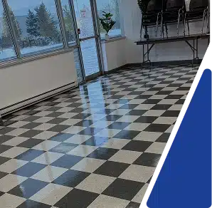 A highly polished black and white checkered floor in an empty room.