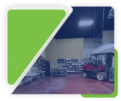 A split graphic showing a green shape on the left and a blue-tinted warehouse interior with a forklift on the right.
